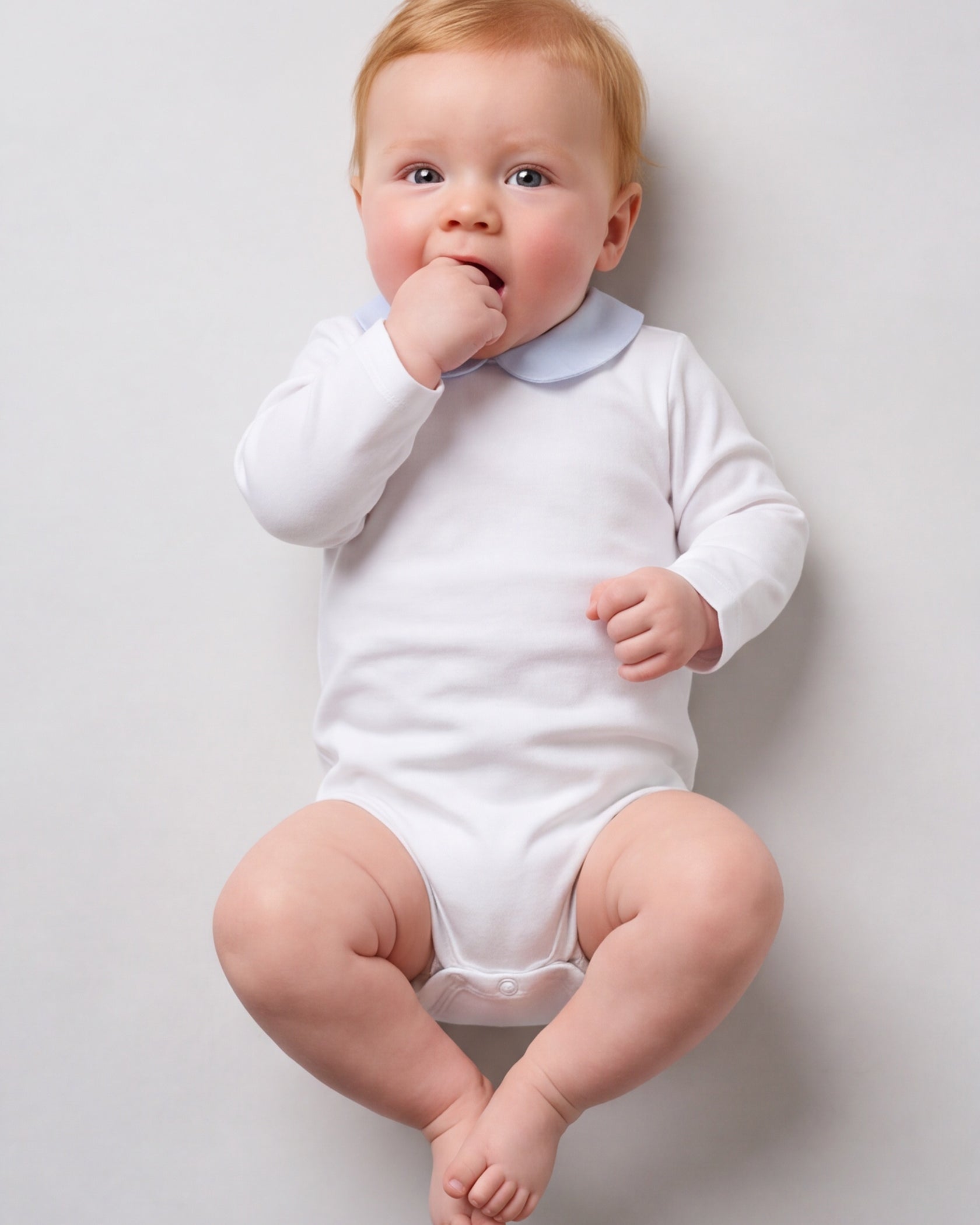 Babyromper met lichtblauwe kraag