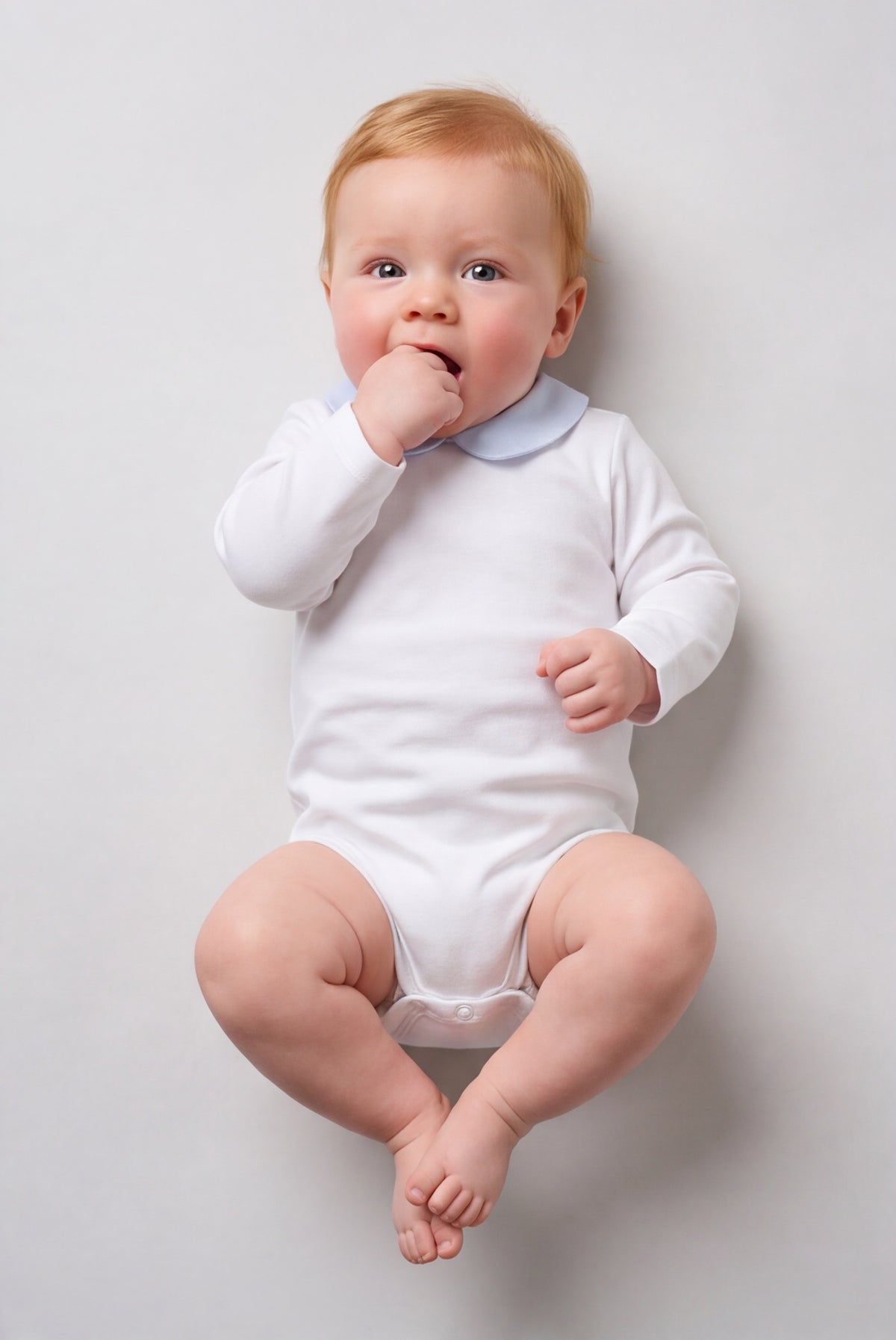 Baby bodysuit with light blue collar