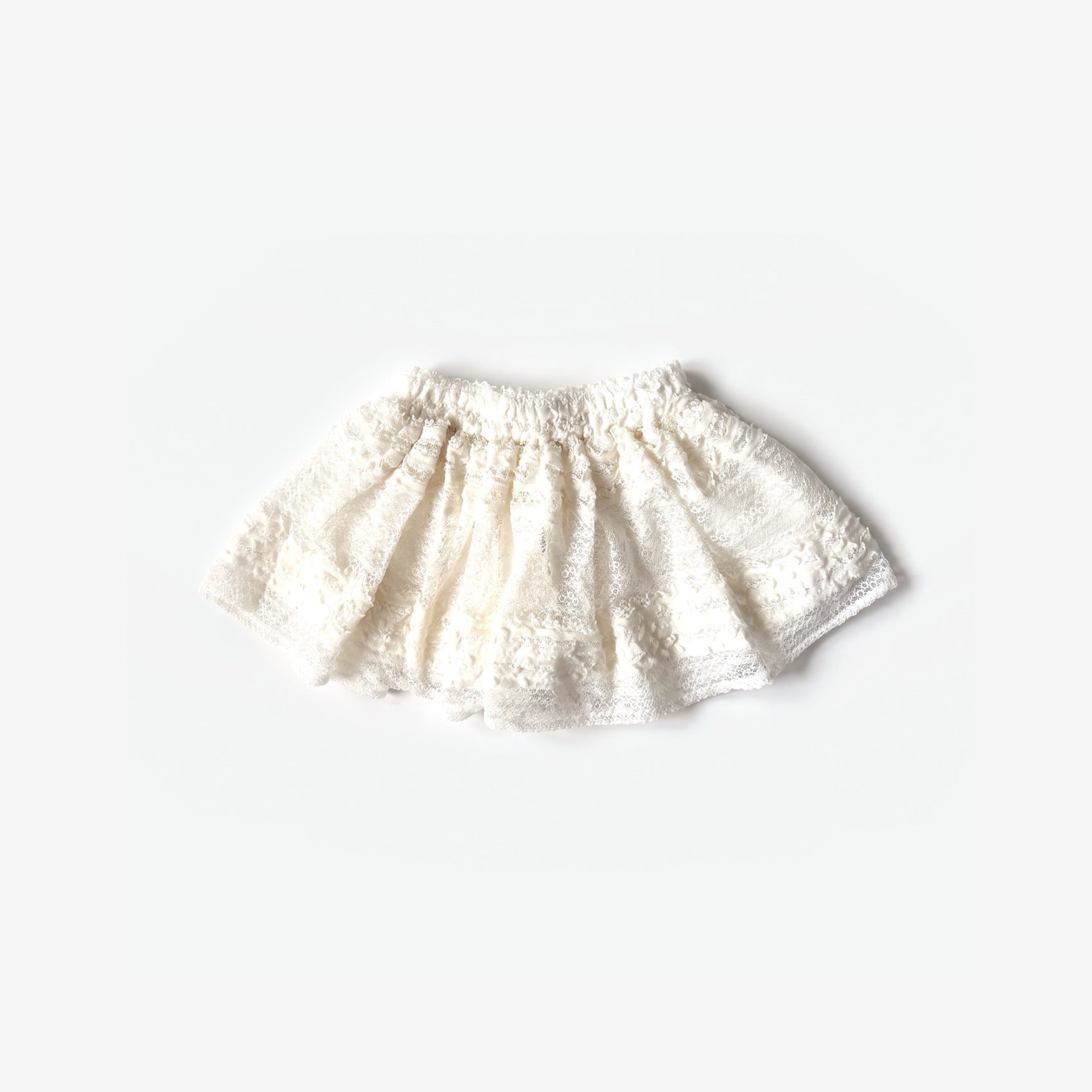 Bahia skirt off white lace, flat lay on a light grey background | Club Cinq
