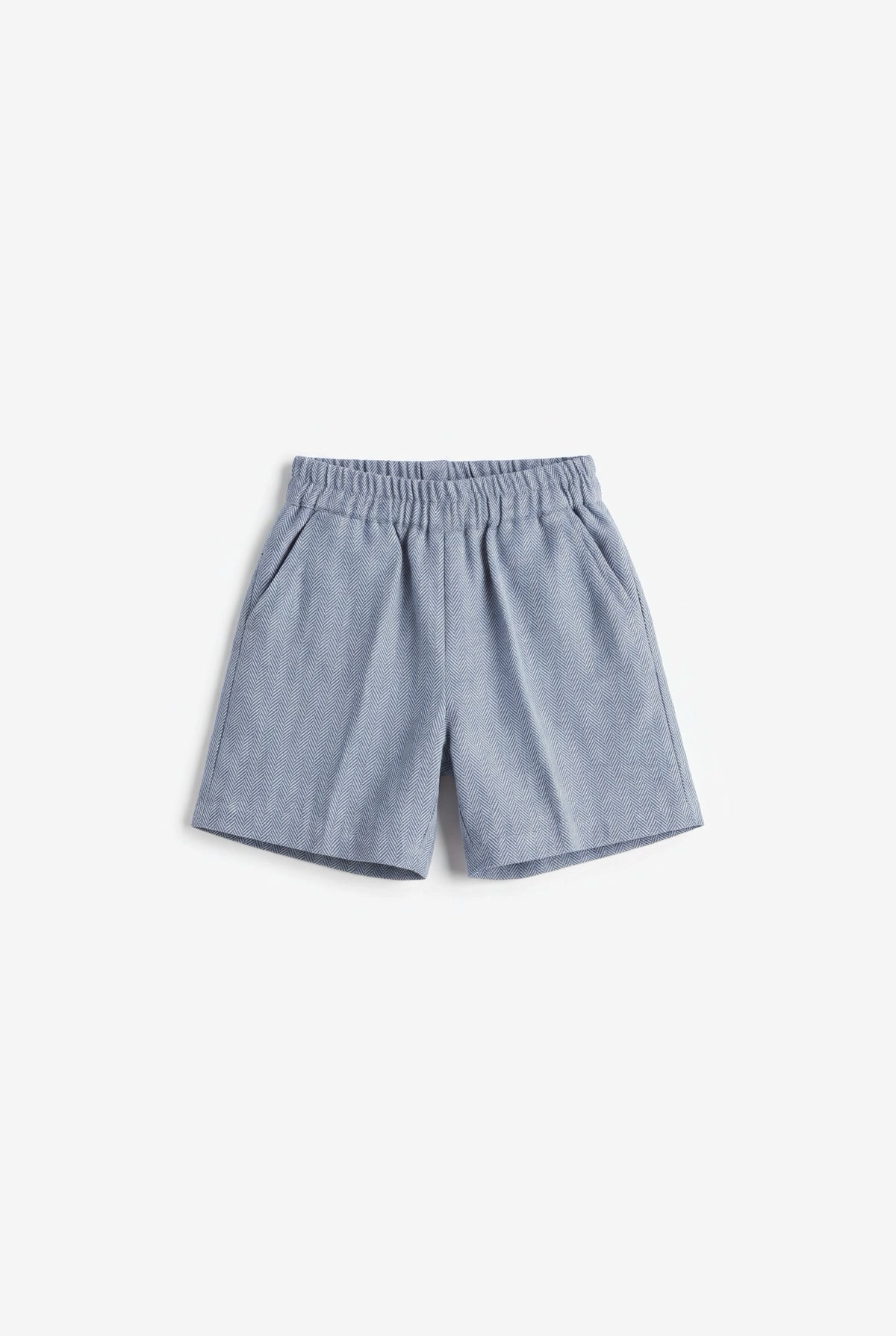 Southport shorts herringbone, flat lay on a light grey background | Club Cinq